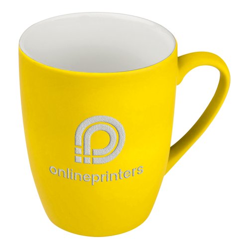 Tasse en cramique jaune avec anse.