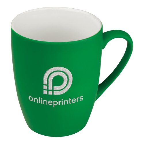 Tasse en cramique verte avec un design arrondi et une anse.