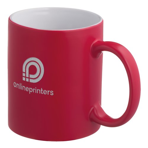 Tasse rouge en cramique avec anse.