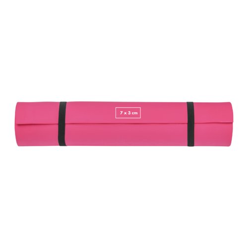 Tapis de yoga rose en mousse avec sangles de maintien.