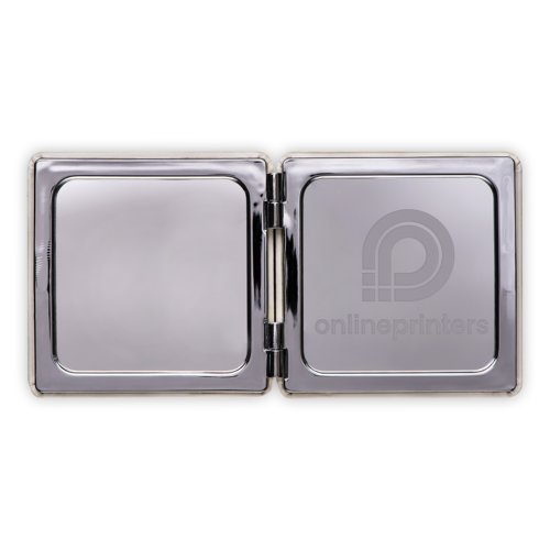 Miroir grossissant argent pliable.
