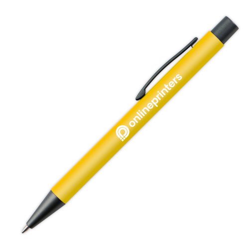 Stylo  bille en plastique jaune avec clip et bouton-poussoir.