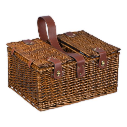 Panier de pique-nique marron en osier avec couvercle et poigne de transport.