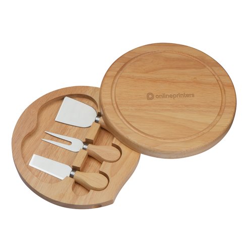 Planche  fromage beige en bois avec couteaux  fromage assortis.