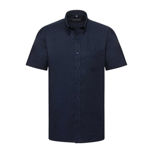 Chemise bleu marine  manches courtes en coton et polyester avec patte boutonne et poche poitrine.