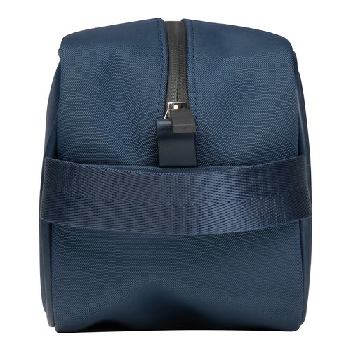 Trousse de toilette en tissu bleu fonc avec fermeture clair.