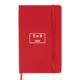 Coffret cadeau rouge avec carnet et stylo.