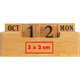 Calendrier de bureau en bois avec blocs de date.